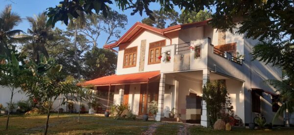 Explore the beauty of Ja-Ela with this stunning house for sale - Image 4