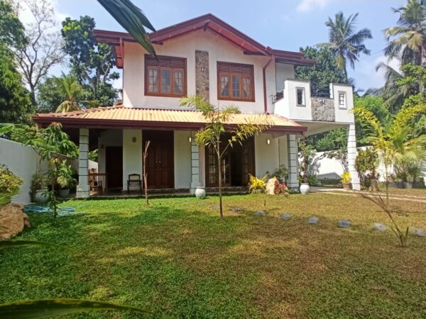 Explore the beauty of Ja-Ela with this stunning house for sale - Image 3