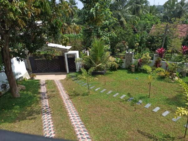 Explore the beauty of Ja-Ela with this stunning house for sale - Image 5