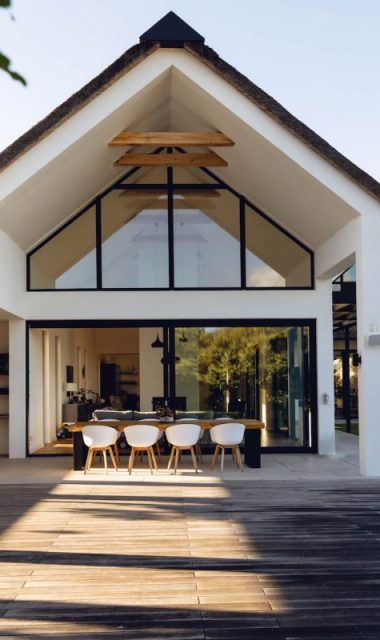 view-of-luxurious-modern-house-exterior-with-dinin-2022-06-11-04-47-38-utc-e1662386284115.jpg